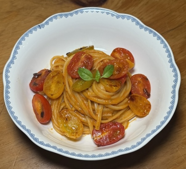 Roasted cherry tomato pasta, finished with fresh basil